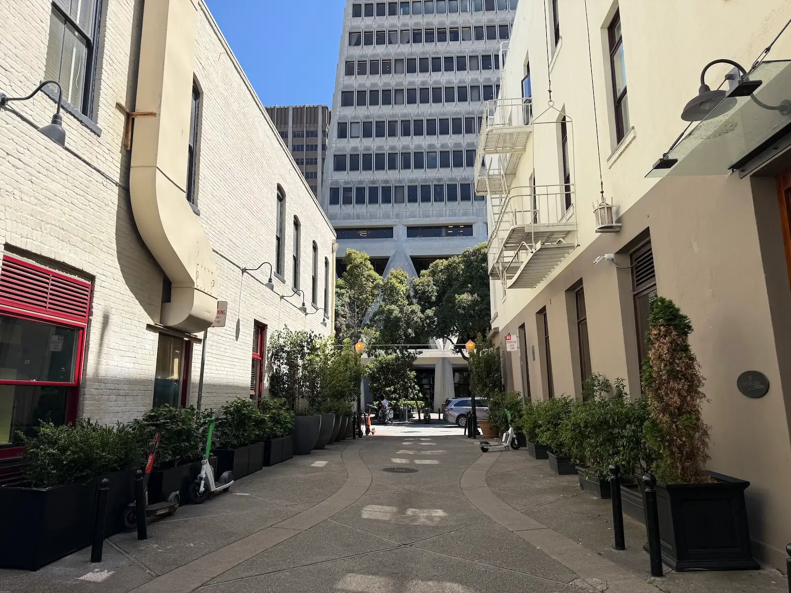 Historic Jackson Square commercial block with the downtown San Francisco skyline nearby